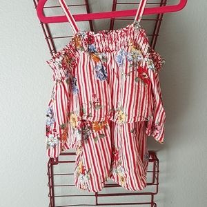 Cute red and white with red,blue,and yellow flower